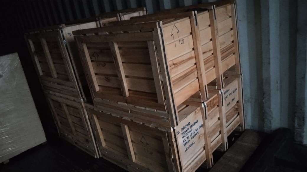 Export crates loaded into a container in Bali