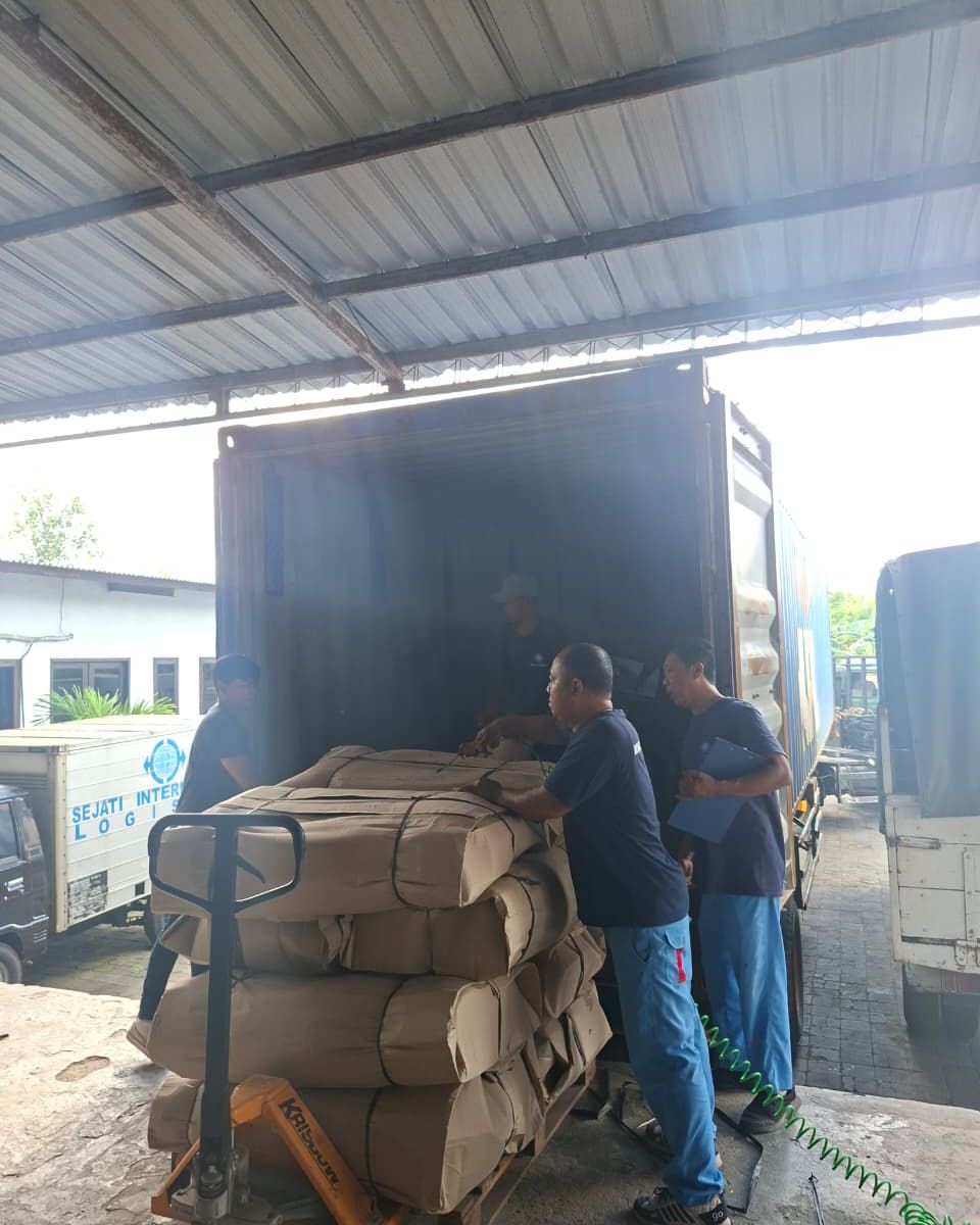 Loading goods onto a truck in Bali